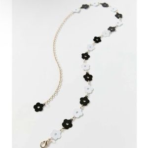 Urban Outfitters black and white daisy chain belt